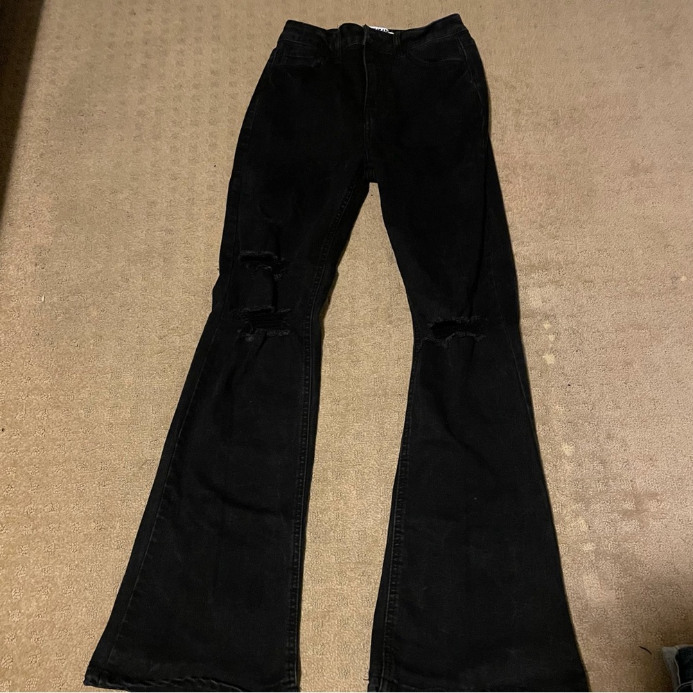 Woman’s Teen black ripped flare jeans